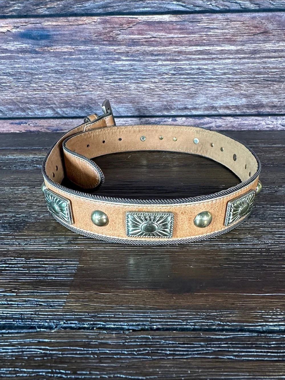 Streets Ahead women’s tan belt with stunning gold accents!